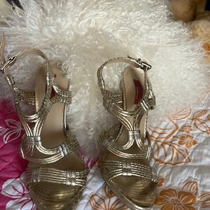 Beautiful high heels. VGUC with exception of a slight smudge on shoe inner heel